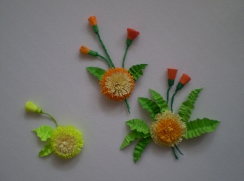 Изготовленные цветки квиллинг одуванчиков