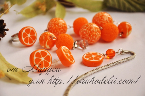 Фото готовых фруктов оранжевого цвета из полимерной глины